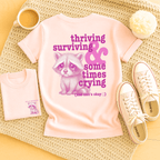 Thriving, Surviving & Sometimes Crying - Adult T-Shirt